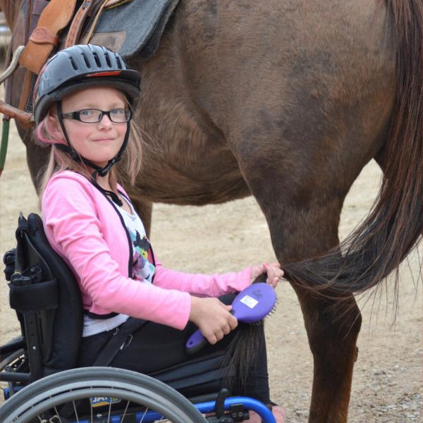 croppedSublette-MESA-girl-brushing-tail